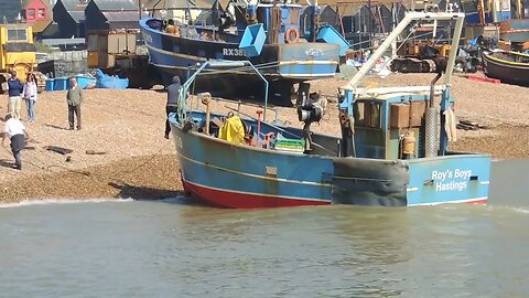 Hastings Fishing Boats Launching From Beach