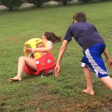 Teen Girl Pushed In Toy Car Falls Over