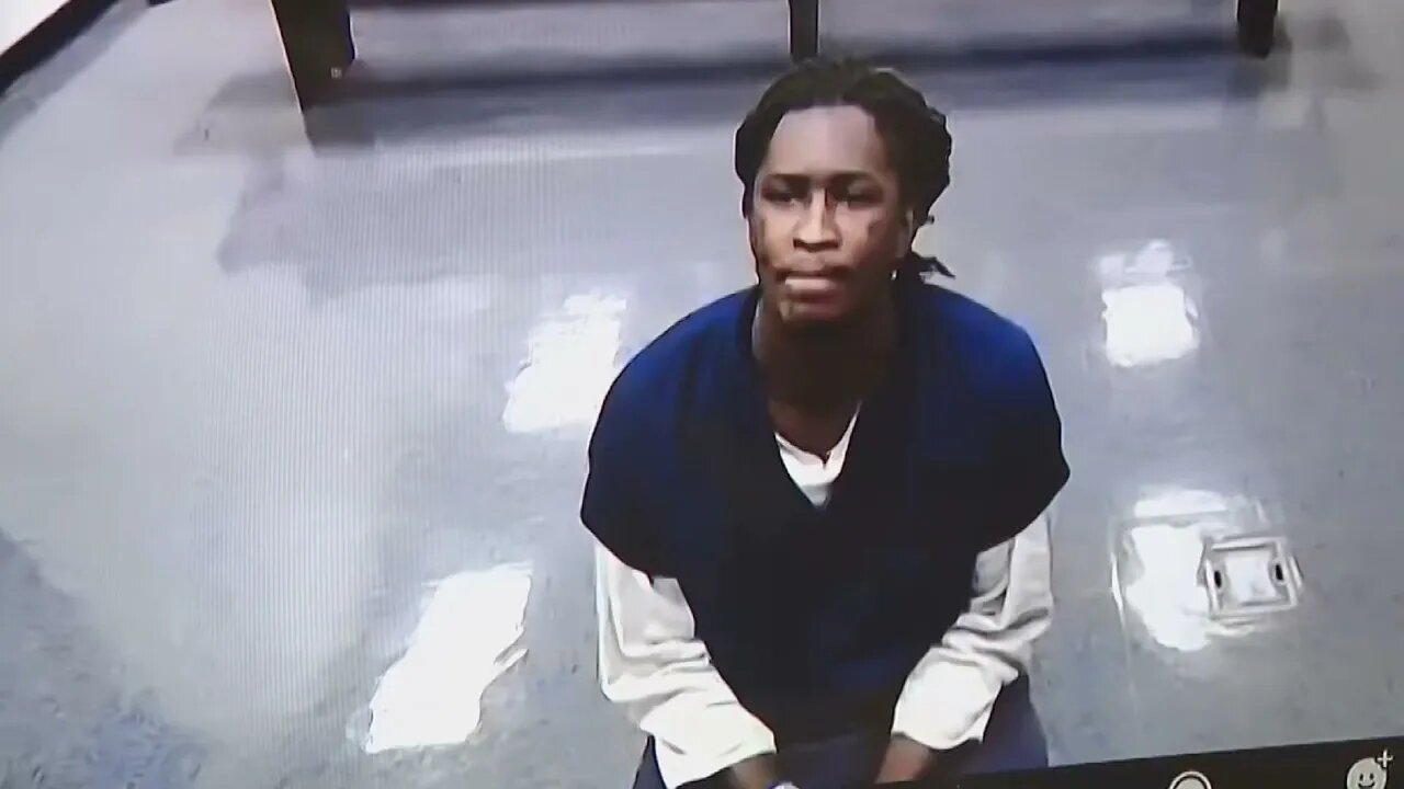 young thug caught getting handed a perc while in court