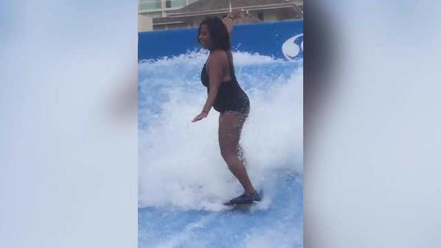 Hilarious Woman Wipes Out While On A Surfboard Simulator