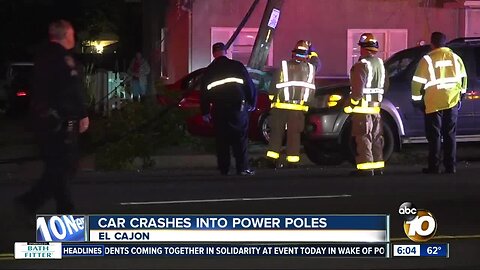 Car crashes into power poles, leaves lines dangling