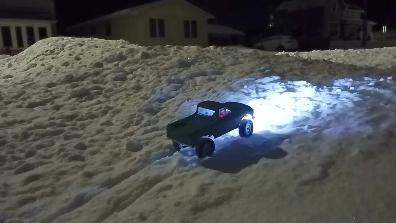 Axial SCX RC Truck Breaks trail threw the fresh powder.