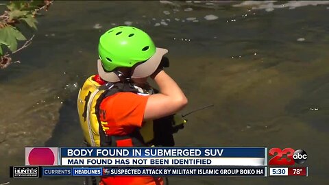 Body found in submerged SUV waiting identification