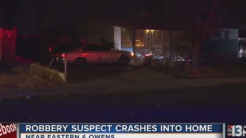 Robbery suspect crashes into elderly woman's home