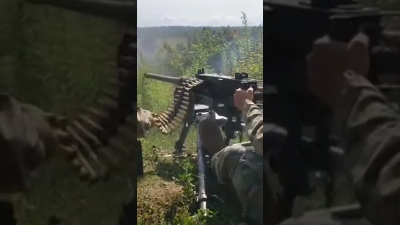 Soldier Firing a Machine Gun