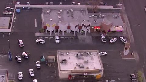 Police surround Donut Shop on Harmon, Maryland Parkway