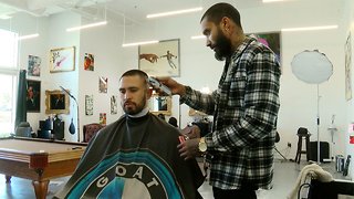 Boynton Beach barbershop Qure helps local art community