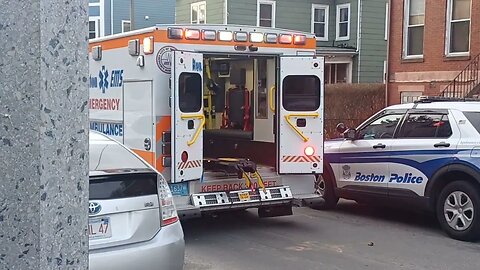 Boston police and EMS dealing with an emotionally depressed individual