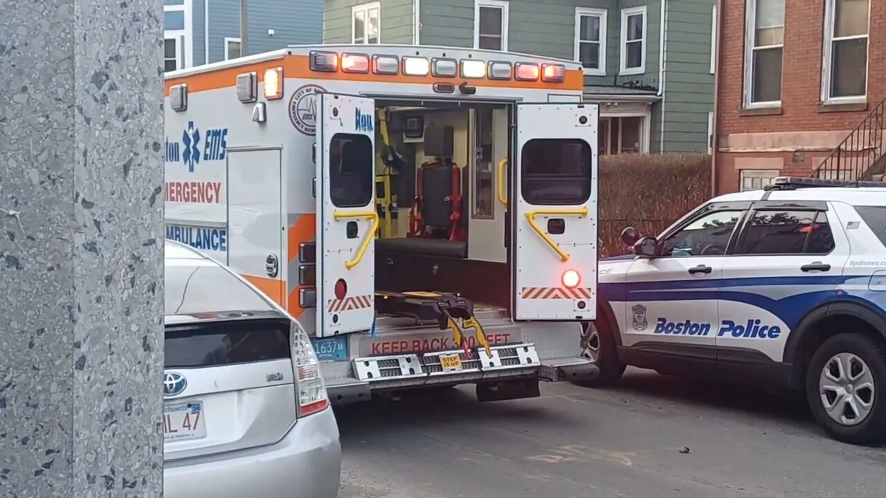 Boston police and EMS dealing with an emotionally depressed individual