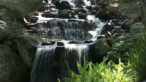 small waterfall on a rocky mountain