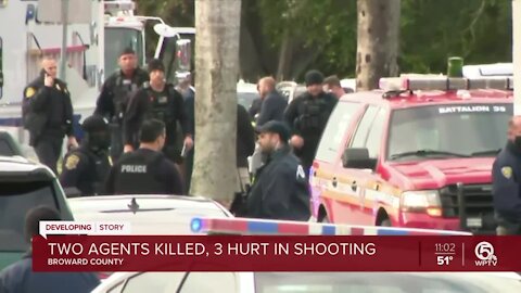 Two FBI agents are shot and killed, and three others wounded