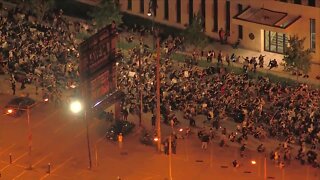 Hundreds honor George Floyd with a silent sitdown in Denver