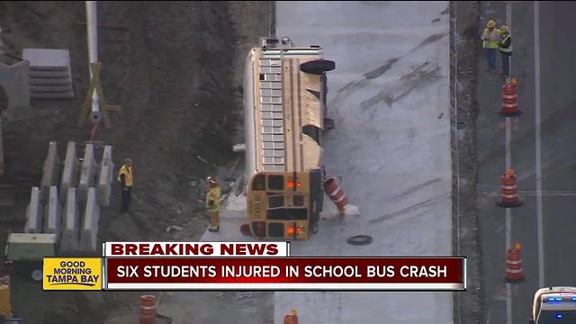 School bus overturns in crash with semi in Brooksville, six high school students injured