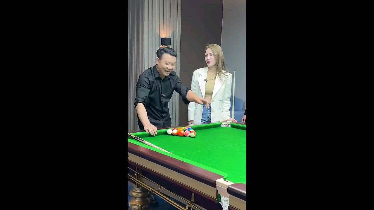 Funny video playing billiards