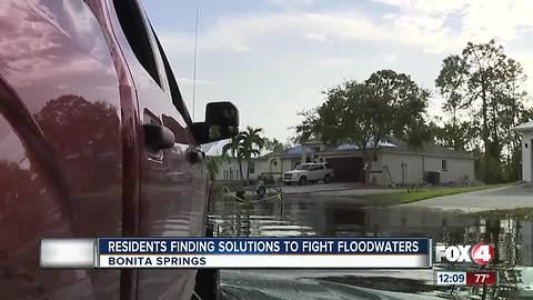 Residents Find Solutions to Fight Flood Waters