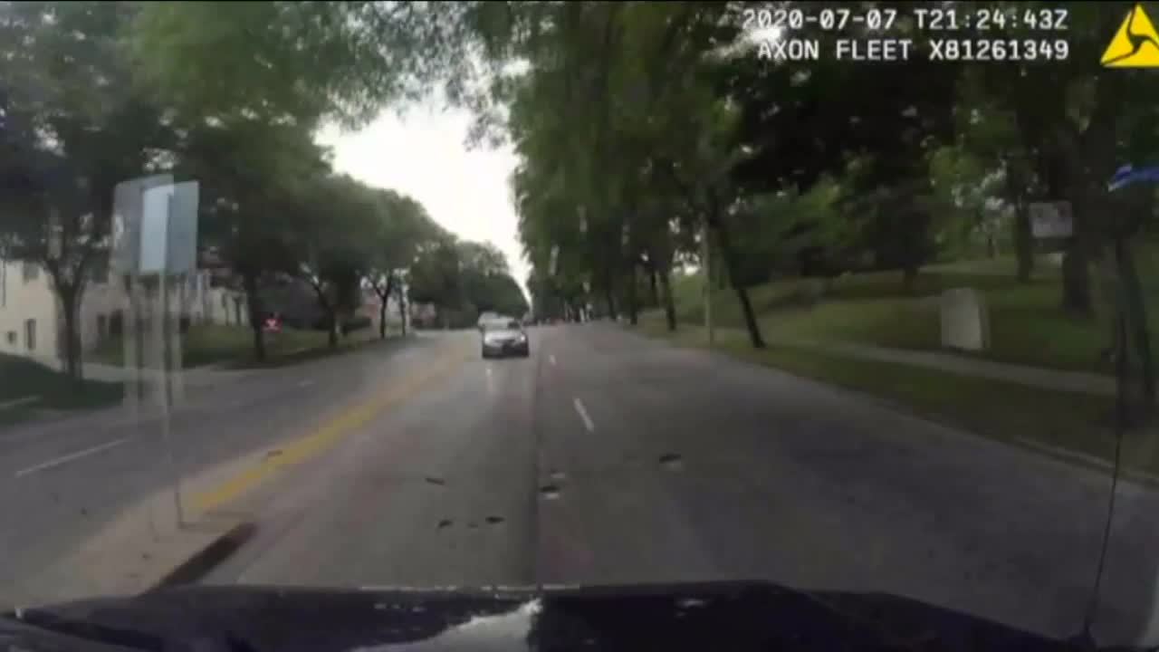 Milwaukee police officer renders aid to victims in car that struck him head-on