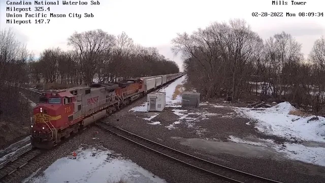 WB CN G845 Empty Grain with BNSF 735 Fakebonnet Leading at Mills Tower on February 28, 2022