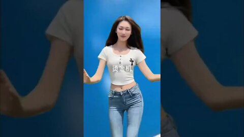 Sexy Chinese Girl Dances In Front Of A Large Printing Machine