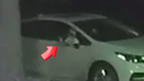 Person in a car in the middle of the night groping because he can not get out or [space]