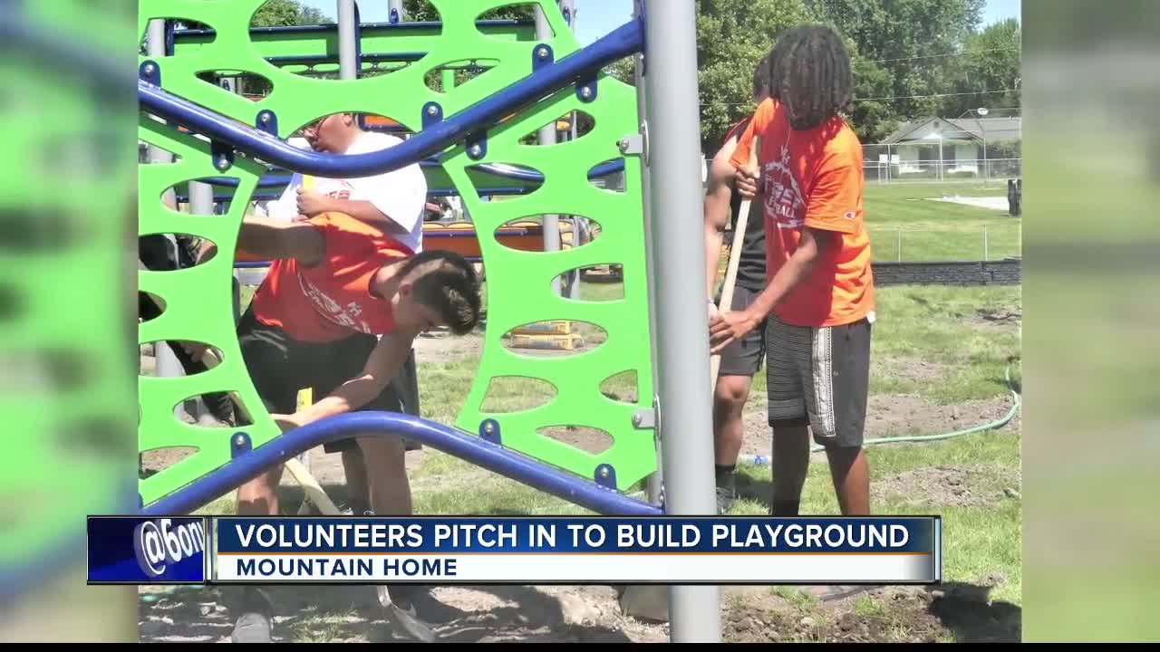 Volunteers help build first-ever playground for Mountain Home school