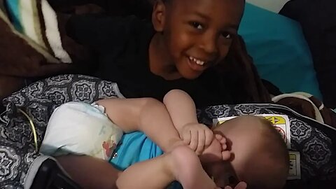 TJ taking care of little Joshua