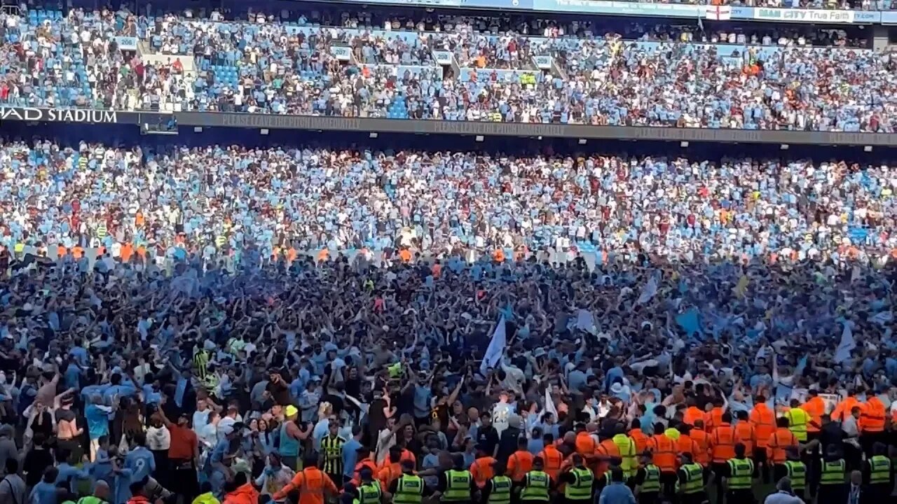 Manchester City fans flood the pitch after 1-0 win over Chelsea