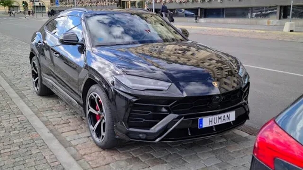 [8k] Lamborghini Urus Black with red calipers near Royal Palace Stockholm Sweden