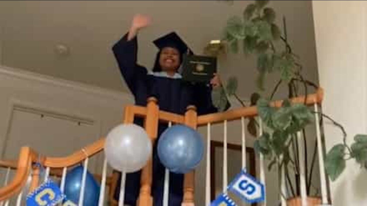 Young woman celebrates with homestyle graduation ceremony