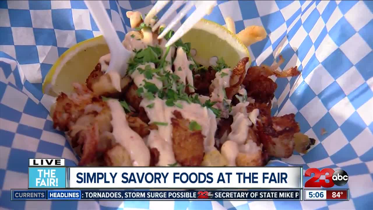 Allison Gargaro tries lobster fries at the fair