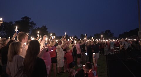 Michigan Center community held vigil Monday night to honor the three men who died at Faster Horses