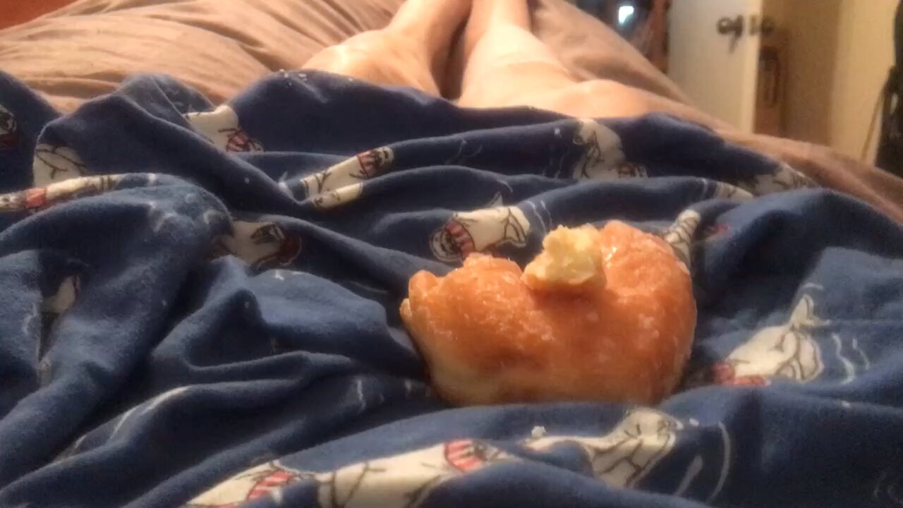 Cat wants doughnut hole