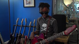 9-year-old guitar prodigy pays it forward