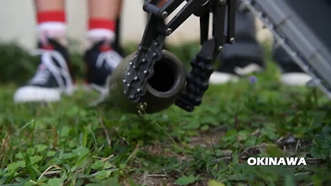 Explosive Ordnance Disposal (EOD) Demonstrate Robotics at Kubasaki High School