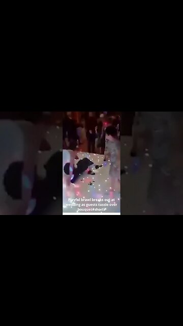 Playful brawl breaks out at wedding as guests tussle over bouquet#shorts