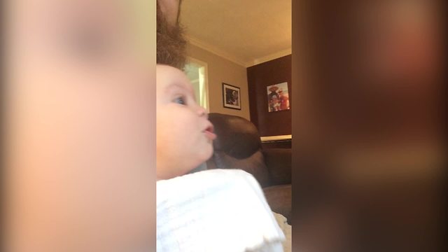 "Baby Boy Howling Along with Dogs"