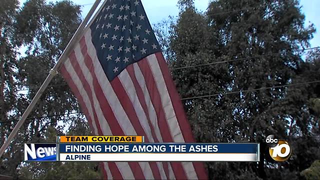 Amid chaos of the West Fire, neighbor saves American flag