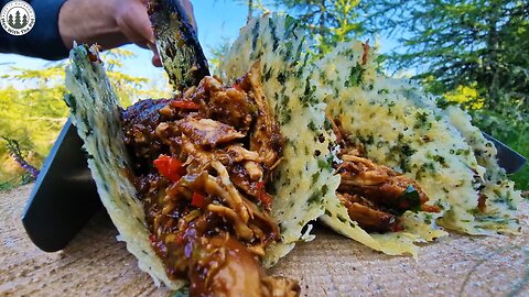 Taco shell made out of parmesan with generous amount of Shredded chicken. Nature Cooking