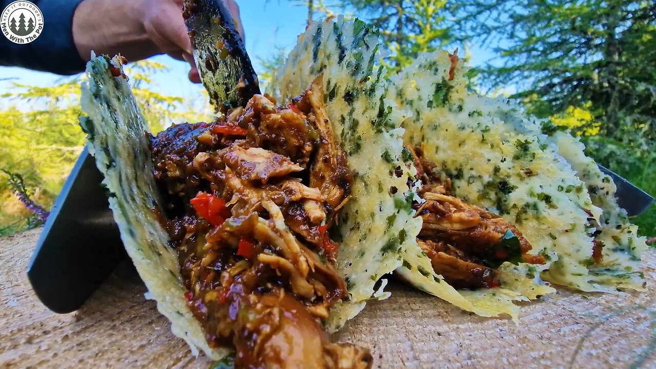 Taco shell made out of parmesan with generous amount of Shredded chicken. Nature Cooking