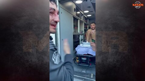 Max Holloway and Yair Rodriguez have a moment in the ambulance