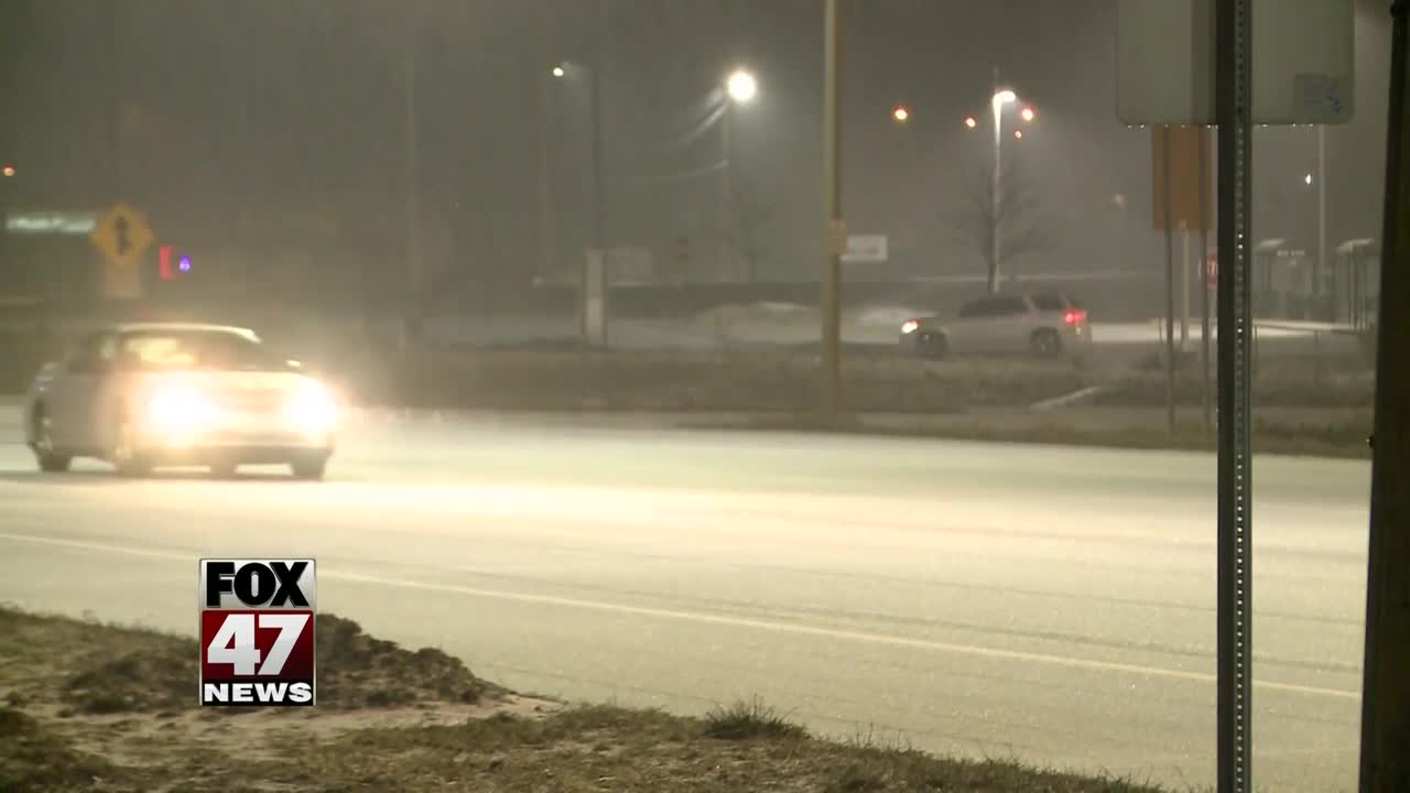 Cars, roads covered in ice