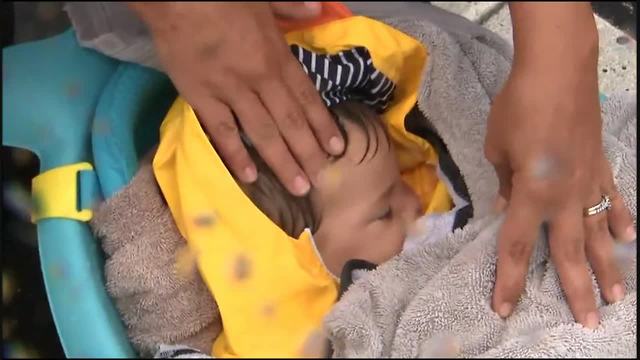 Baby saved from Harvey floodwaters