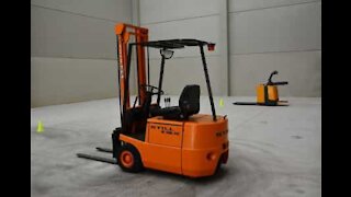 Man does 50 pence challenge with a forklift