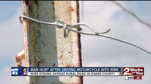 Motorcyclist survives after driving into baling wire strung across rural road