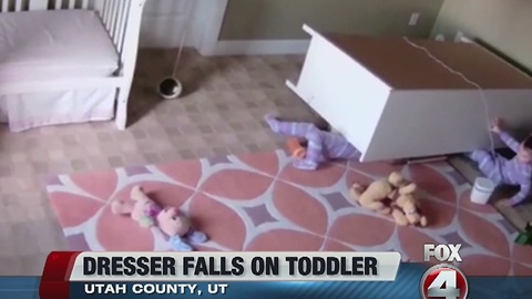 Toddler saves twin from fallen dresser