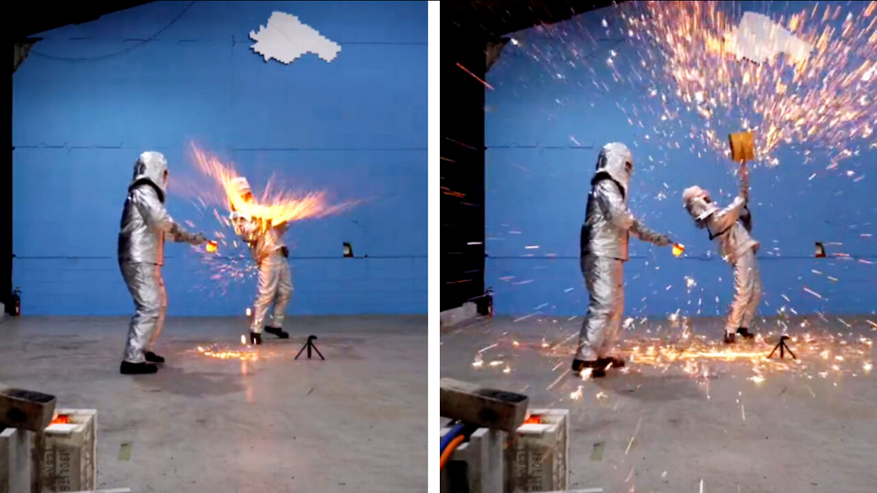 Slamming molten iron with a shovel creating beautiful sparkles