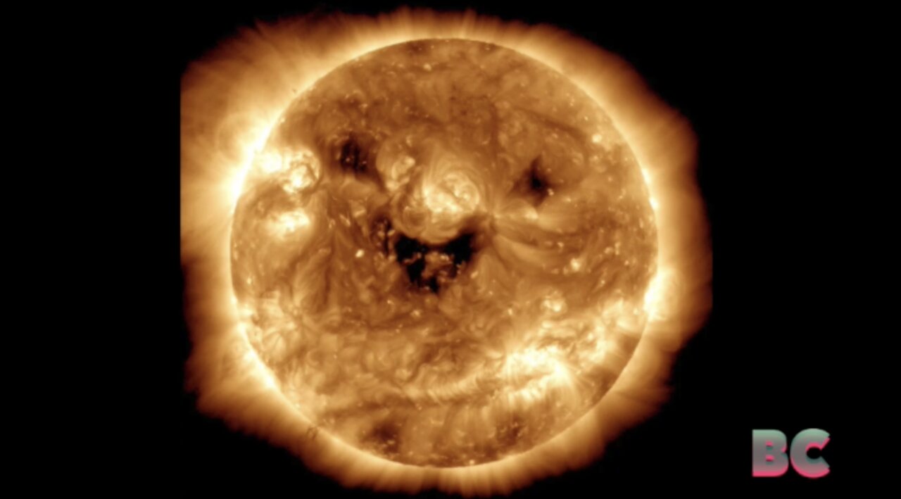 The sun was ‘smiling’ in a NASA photo. It might be a warning for Earth.