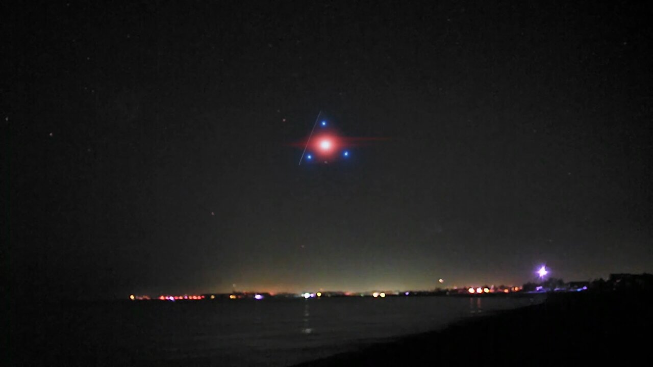 TR-3B black triangle UFO uncloaking from stealth mode over the sea