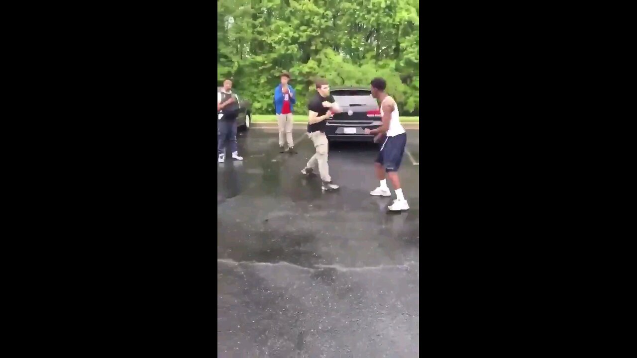 Fight: 2 guys in parking lot. Not a lot of context.