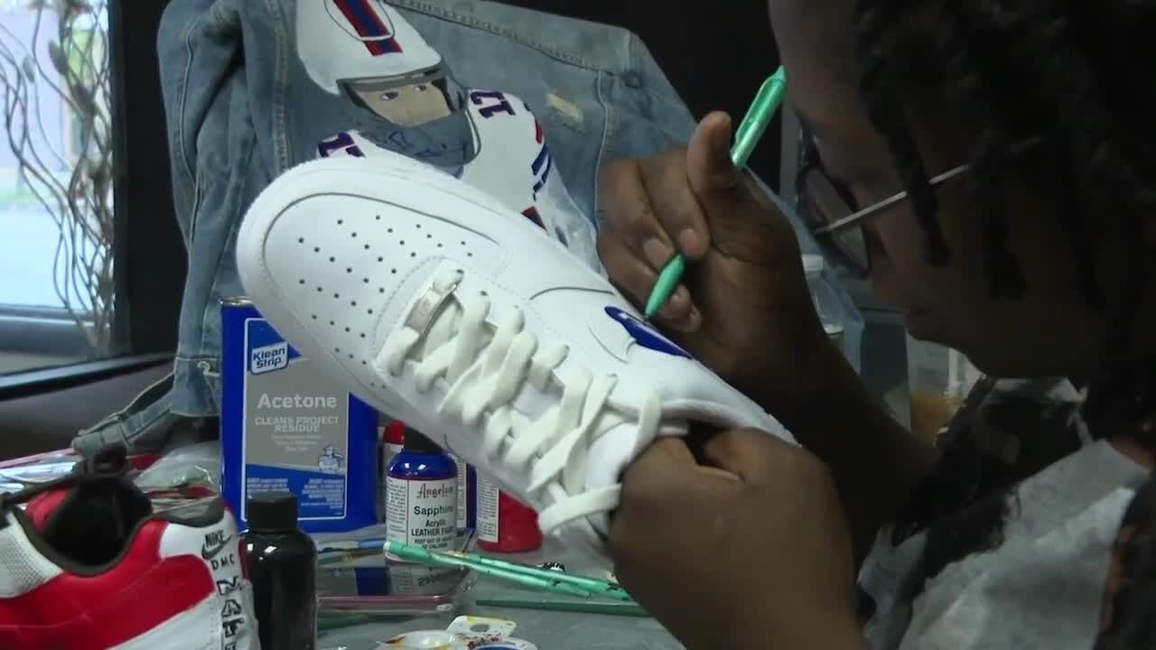 "It all begins with an idea." Buffalo woman follows dream, paints Bills-themed sneakers for a living