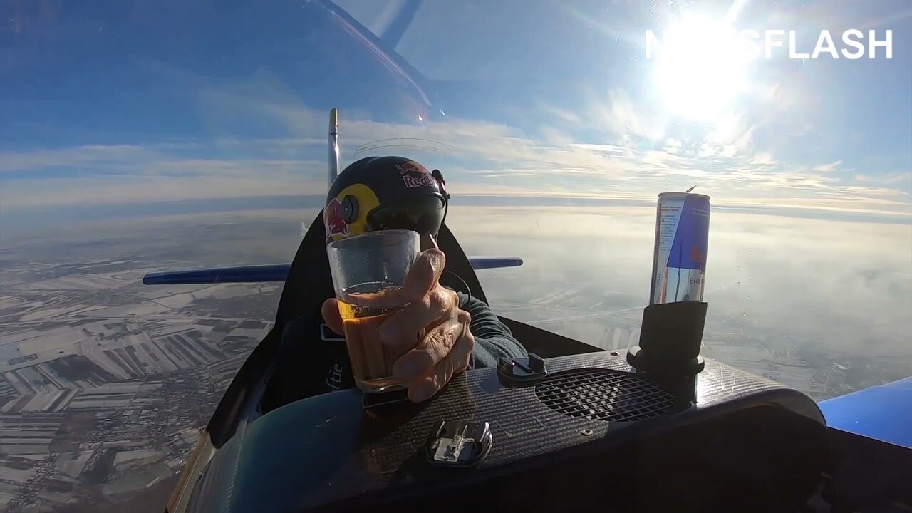 Drinking Red bull in the air on fighter jet